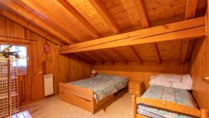 Postel nebo postele na pokoji v ubytování 35 CHALET - Chalet lumineux 6 pers