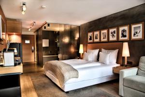 Postel nebo postele na pokoji v ubytování Hotel Madlein