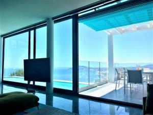 A television and/or entertainment centre at Villa Altea Gales