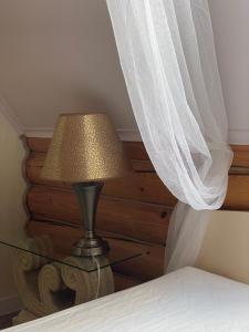 Ein Bett oder Betten in einem Zimmer der Unterkunft Bukovynskiy Zatyshok Chalet
