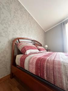 Un pat sau paturi într-o cameră la Casa Olivastri