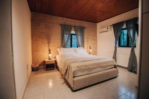 Letto o letti in una camera di Pine View Boutique Hotel Adults Only
