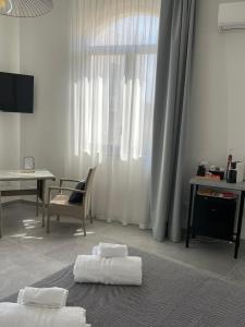 TV a/nebo společenská místnost v ubytování Stanza Sirio13 + 11 fotografií