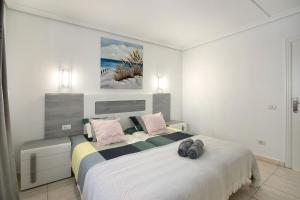 Ένα ή περισσότερα κρεβάτια σε δωμάτιο στο Breeze Island +18 φωτογραφίες