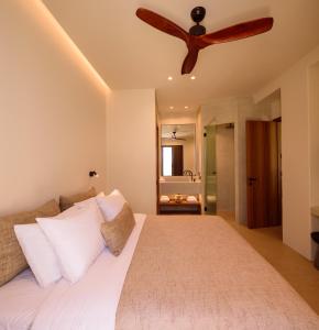 Ένα ή περισσότερα κρεβάτια σε δωμάτιο στο Elessa Hotel