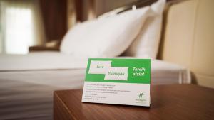 A bed or beds in a room at Holiday Inn Ankara-Kavaklidere by IHG