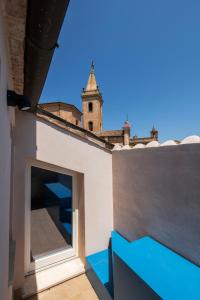 a view from the roof of a building with a tower at Dimora Condivi in Ripatransone