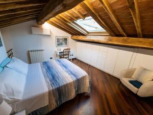 Postel nebo postele na pokoji v ubytování Casa Tecla alle Mura della Città + 18 fotografií