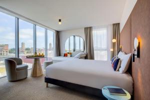 Posteľ alebo postele v izbe v ubytovaní Mercure Dunkerque Centre Gare