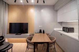 TV a/nebo společenská místnost v ubytování Contessa Bianca Luxury Suites