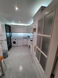Kuchyň nebo kuchyňský kout v ubytování Superbe appartement calme vue mer