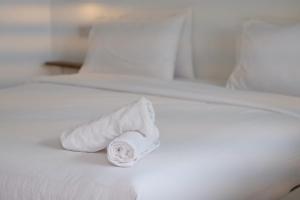 Кровать или кровати в номере Jasmine Resort
