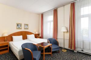 Danubius Hotel Raba客房内的一张或多张床位