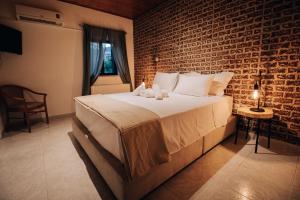 Letto o letti in una camera di Pine View Boutique Hotel Adults Only
