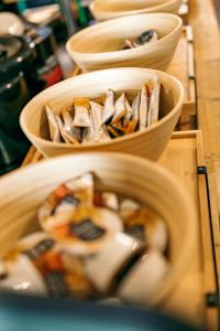 a group of bowls of food on a table at The Flying Pig Beach Hostel, ages 18 - 40 in Noordwijk aan Zee