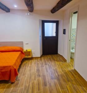 A bed or beds in a room at Il Gaza