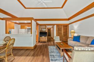 a living room with a couch and a table at Charming 1br TopFloor Condo in Poipu, Athletic Club 432 in Koloa