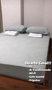 Ліжко або ліжка в номері POUSADA HOTEL SANTO ANTÔNIO