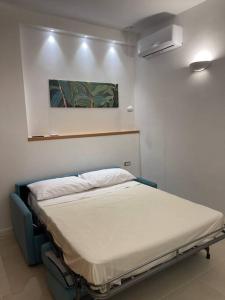a hospital room with a bed in a room at Oleander Apartment in Castellammare di Stabia