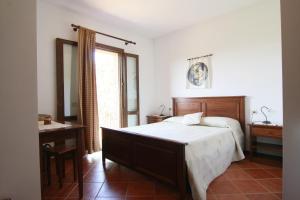 Posteľ alebo postele v izbe v ubytovaní Agriturismo La Steccaia Alta