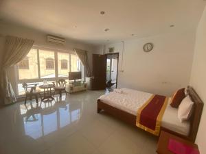 Postel nebo postele na pokoji v ubytování Đức Anh HoTel Vũng Tàu