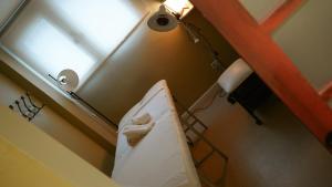 Cama ou camas em um quarto em Hotel Canal Beagle