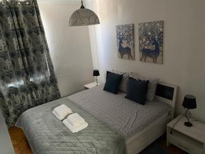 Postel nebo postele na pokoji v ubytování Apartman Colapis- Netflix, self check in, free parking, premium location!