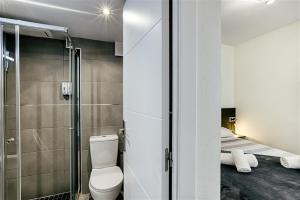 Koupelna v ubytování K Beach D-Luxe