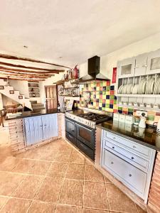 Küche/Küchenzeile in der Unterkunft Cortijo Cuscurro