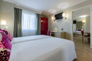Cama o camas de una habitación en Olissippo Marquês de Sá