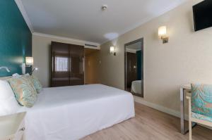 Cama o camas de una habitación en Olissippo Marquês de Sá