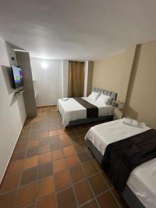 Voodi või voodid majutusasutuse Hotel Valle Central toas