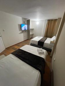 Voodi või voodid majutusasutuse Hotel Valle Central toas