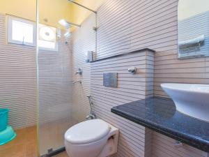 Koupelna v ubytování Hotel Anuvibha Malviya Nagar