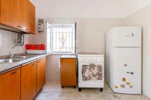 Kuchyň nebo kuchyňský kout v ubytování Villa Mara