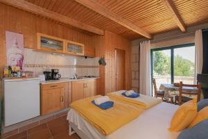 a kitchen with two beds in a room at Casa Killa in Granadilla de Abona