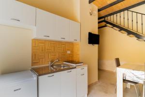 Зображення з фотогалереї помешкання La rimesa di Tittì - Simone у місті Алеціо