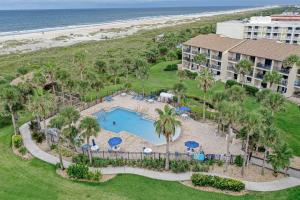 an aerial view of the resort and the beach at Modern oceanfront condo with two pools & private washer/dryer in Saint Augustine