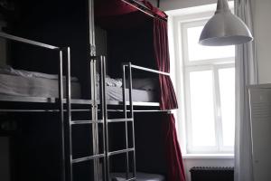 Postel nebo postele na pokoji v ubytování Wake Up Wellness Hostel