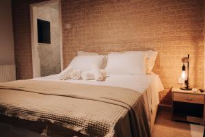 Letto o letti in una camera di Pine View Boutique Hotel Adults Only