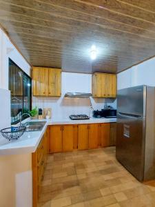 Kuchyň nebo kuchyňský kout v ubytování Casa Bambú, con ac y wifi