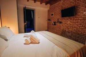 Letto o letti in una camera di Pine View Boutique Hotel Adults Only