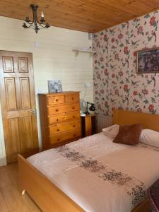 Postel nebo postele na pokoji v ubytování Beech Lodge B&B