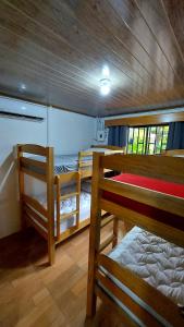 Postel nebo postele na pokoji v ubytování Casa Bambú, con ac y wifi