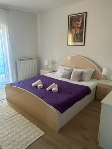 Ένα ή περισσότερα κρεβάτια σε δωμάτιο στο Deluxe apartman Mimi Viskovo with a free parking space