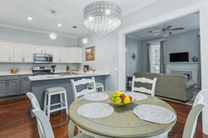 a kitchen and dining room with a table and chairs at Charming Apartment Retreat in Historic Jefferson! in Jefferson
