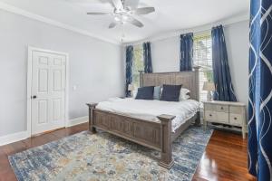 a bedroom with a bed and a ceiling fan at Charming Apartment Retreat in Historic Jefferson! in Jefferson