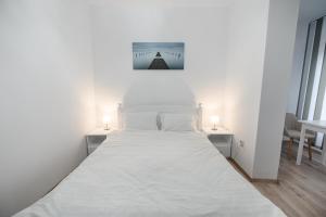 Postel nebo postele na pokoji v ubytování 1 Mai