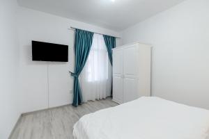 Postel nebo postele na pokoji v ubytování 1 Mai