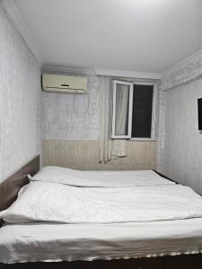 Postel nebo postele na pokoji v ubytování Guest house 2 floor